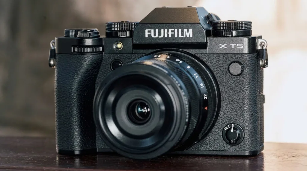 Fujifilm X-T5 APS-C mirrorless camera with tactile mechanical dials for street photography.